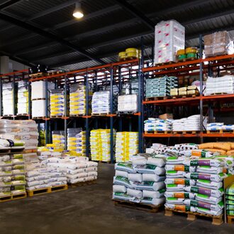 Pig feed medications are stored in a warehouse.
